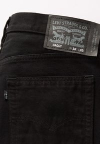 Levi's® Skateboarding SKATE BAGGY 5 POCKET - Vrećaste traperice - black grape