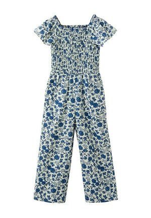 Combinaison blanche à imprimé floral bleu, manches courtes bouffantes, encolure carrée smockée et pantalon à jambes larges.