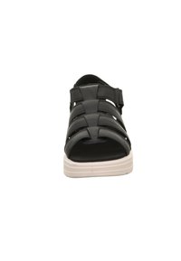 Sandalo in pelle nera con punta aperta, cinturino regolabile e parte superiore testurizzata. Suola in gomma bianca, vista frontale, con motivo intrecciato.