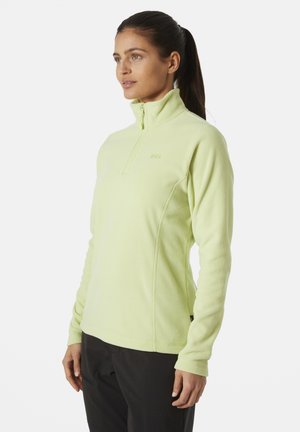 Sudadera de forro polar verde claro con cuello alto, cremallera frontal de media longitud y detalle de logotipo a tono. Cuenta con mangas largas y costuras planas.