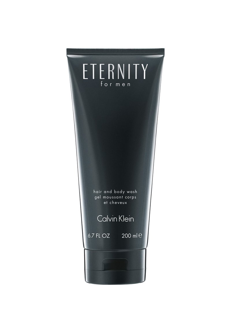 Tube en plastique noir de gel douche et shampooing pour le corps, étiqueté "Eternity for Men" par Calvin Klein. Capacité de 200 ml, avec un bouchon à rabat.