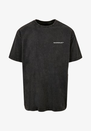 Svart bomull t-skjorte med rund hals, korte ermer og et vintage-uttrykk, med en hvit trykt logo på forsiden.