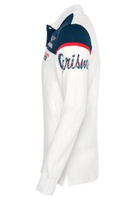 Hvid langærmet polo skjorte med navy krave og røde detaljer, med broderet tekst "Grisina" på ærmet og logo på brystet.