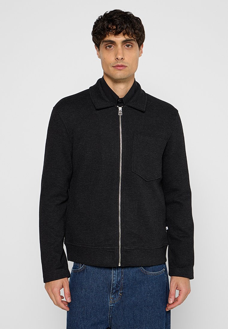 Minimum Lichte jas grijs