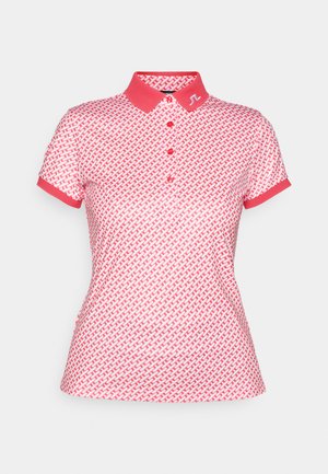 Polo shirt in roze met een wit geometrisch patroon, korte mouwen en een kraag. Voorzien van knopen en een logo op de kraag.