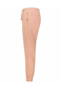 Peach-colored sweatpants made of soft cotton blend, featuring a drawstring waist, side pockets, and a light speckled texture.