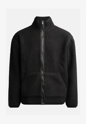 Black fleece jacket with high collar, full front zipper, two side pockets, textured fabric, and black trim around cuffs and hem.