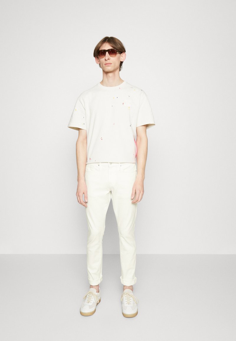 FRAME HOMME - Karcsúsított farmerek - whisper white