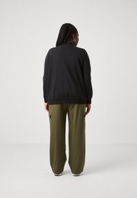 ONLY Carmakoma CARJOYCE - Bomber Jacket - black