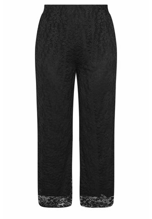 Pantalones anchos de encaje negro recortados con cintura alta y patrón floral texturizado, con un dobladillo de encaje semitransparente.