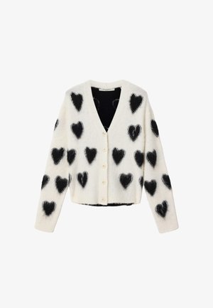 Fehér kardigán fekete bolyhos szívmintákkal, V-nyakkivágással, gombos lezárással és hosszú ujjakkal. Puha tapintású, rövidített fazonú.