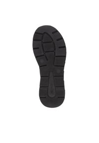 Suola di scarpa in gomma nera con motivi testurizzati, caratterizzata da scanalature e incisioni per trazione e supporto. Logo del marchio visibile.