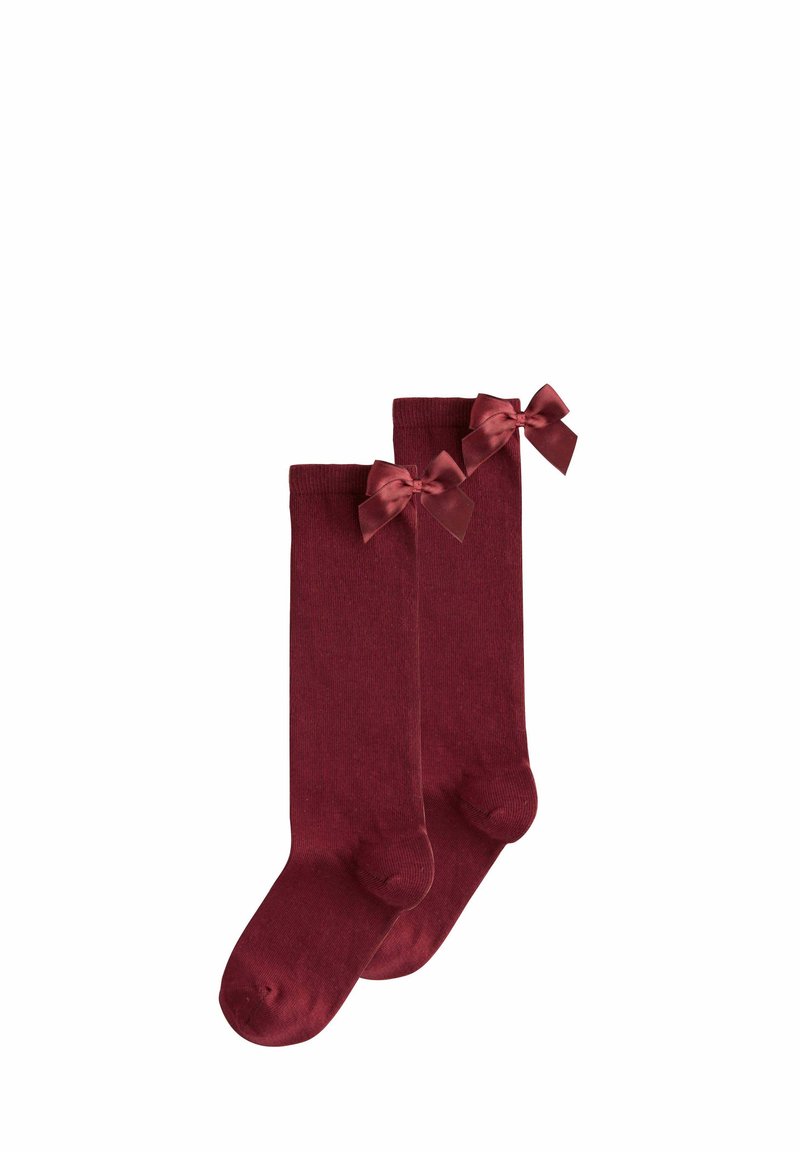 Burgundy knee-high socks featuring smooth texture and satin bows at the top, designed for a fitted look.