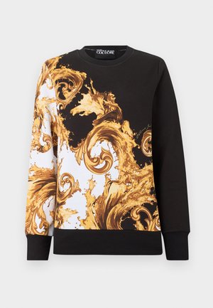 Crna majica s kapuljačom sa zlatnim baroknim uzorkom u obliku kovrča na prednjem dijelu i na lijevom rukavu, rebrasti manšeti i rub, okrugli izrez, oznaka Versace Jeans Couture.