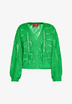 Vihreä neulottu kardigan, jossa on V-pääntie, pitkät hihat ja nappikiinnitys. Tässä on pitsinen kuvio ja ribbireunat hihansuissa ja helmassa.