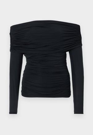 Haut noir à épaules dénudées avec des manches longues ajustées, texture froncée et design près du corps. Fabriqué en tissu doux et extensible.