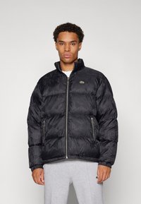 Lacoste Jakna ispunjena paperjem - black