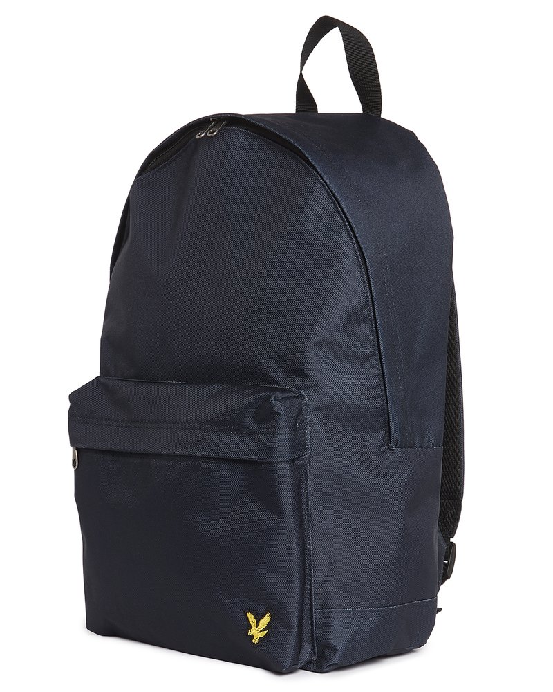 Tume sinine seljakott ees lukuga tasku, must ülasanga, polsterdatud rihmad ja väike kollase linnu logo alumise tasku nurgas.