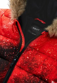 Next STANDARD - Talvihaalari - red galaxy print