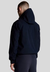 Ναυτικό μπλε μπουφάν με κουκούλα και υφασμάτινη υφή, μανίκια πλήρους μήκους και εμφανείς ραφές. Απλός, μοντέρνος σχεδιασμός με άνετη εφαρμογή.