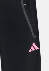 adidas Performance JUVENTUS TIRO25 COMPETITION TECH TRAVEL PANT KIDS UNISEX - Treniņtērpa apakšdaļas - black/bliss pink