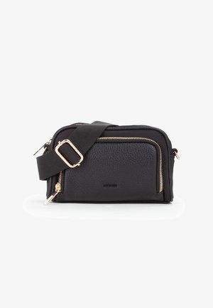 Schwarze Umhängetasche mit strukturierter Oberfläche, goldenen Reißverschluss-Elementen, verstellbarem Riemen und einer vorderen Reißverschlusstasche. Kompakte und praktische Gestaltung.