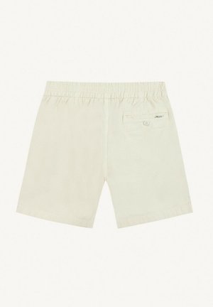 Shorts en tissu texturé couleur crème avec taille élastique et une poche arrière avec bouton, vus de dos.
