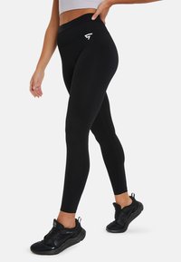 SQUATPROOF Pajkice – hlače - black
