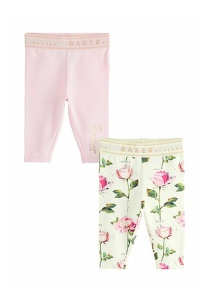 Zwei Leggings-Paare: eines einfarbig pink mit einem goldenen Logo-Bund, das andere weiß mit floralem Muster und goldenem Logo-Bund.