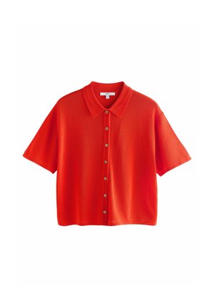 Rode polo shirt met korte mouwen, gemaakt van een gestructureerd materiaal, met een knoopsluiting aan de voorkant en een klassieke kraag.