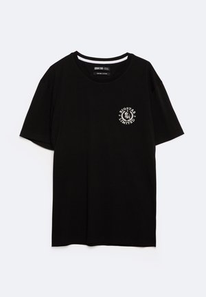 Black cotton t-shirt with a round neckline and short sleeves. Features a white circular logo on the left chest area. Plain design, no patterns.