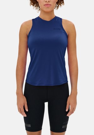 Navy sleeveless athletic top with a smooth texture and rounded neckline, paired with black fitted shorts featuring reflective accents.