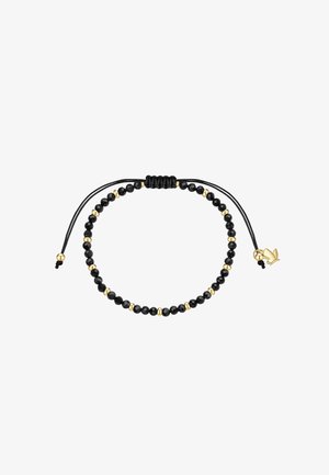 Sort perlearmbånd med små gyldne perler og en justerbar sort snor, der ender med en gylden lotus vedhæng.