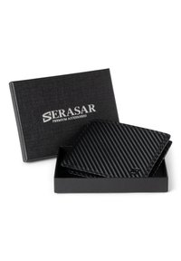 Black carbon fiber wallet in a black textured box with silver branding. Wallet features a smooth, detailed weave design and folded edge.
