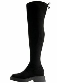 Svarta över knäna stövlar i mjuk mocka med en platt gummisula, med en rund tå och dekorativa dragband upptill.