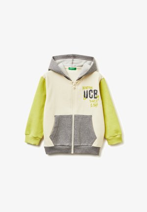 Farbenfrohes Zip-Hoodie mit grauem Kapuze, cremefarbener Vorderseite und limonengrünen Ärmeln. Verfügt über eine Kängurutasche und ein grafisches Detail "Benetton UCB".