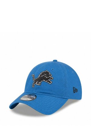 Blue baseball cap with a black lion logo on the front and an adjustable strap visible at the back.
