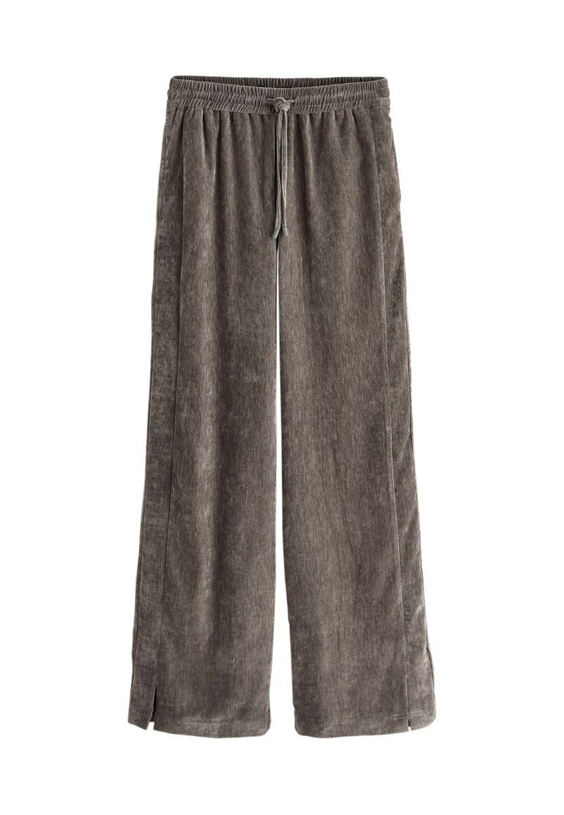 Pantaloni larghi marroni con vita elastica e cordoncino. Tessuto morbido con spacchetti laterali all'orlo. Design casual.