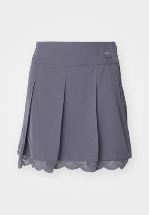 Pleated gray sports skirt with a textured lace hem, elastic waistband, and subtle logo. Made from lightweight, stretchy material.
