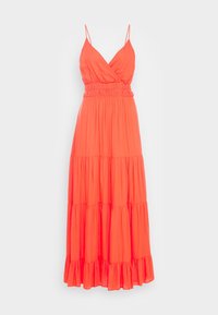 Robe maxi de couleur corail vif, avec un décolleté en V, des bretelles fines, une taille froncée et un ourlet à volants en couches. Fabriquée en tissu léger et fluide.