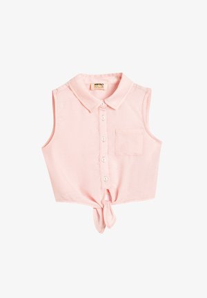 Lyserød, ærmeløs skjorte med knaplukning og krave, brystlomme og en bundknude. Fremstillet af blødt stof med en glat tekstur.