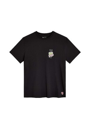 T-shirt en coton noir avec un graphisme multicolore et le texte « BAD BOY » sur la poitrine gauche, ainsi qu'un petit logo rose sur l'ourlet inférieur.