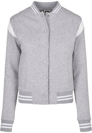Veste sweatshirt grise avec une fermeture à boutons sur le devant, accents de manches blanches et poignets et ourlet côtelés rayés. Fabriquée en tissu doux.