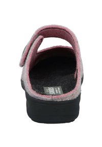 Gray and pink felt slipper with an open-back design, adjustable strap and a textured black rubber sole, featuring a logo tag inside.