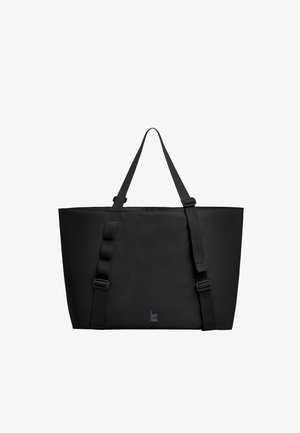 Borsa tote rettangolare nera con due spallacci regolabili e un piccolo logo verticale vicino al centro inferiore.