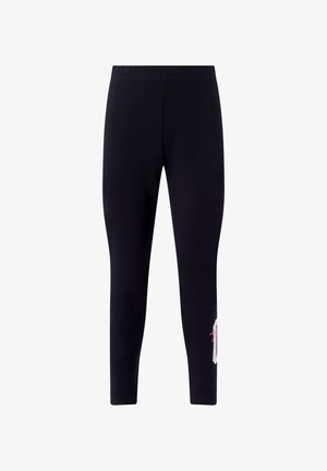 Leggings neri aderenti con un piccolo dettaglio grafico rosa e bianco vicino alla parte inferiore esterna della gamba destra.