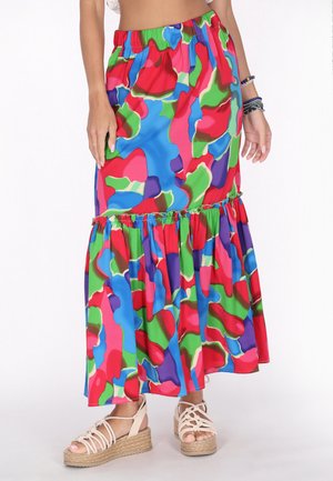 Maxi gonna colorata e decorata con vita elastica, fondo arricciato e vivaci sfumature di blu, rosso, verde e viola.