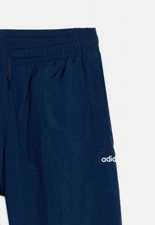 adidas BLOCKED JUNIOR UNISEX - Tracksuit bottoms - night indigo/grey two — photo 3