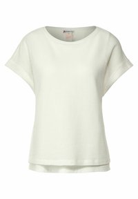 Lättvikts, kortärmad t-shirt i off-white, med ett texturerat våffelmönster, rundad halsringning och en avslappnad passform.