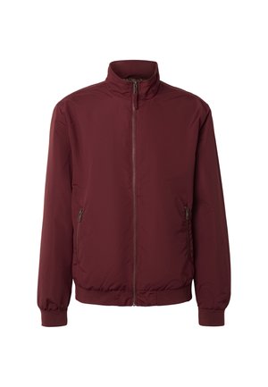 Bordeauxroter Reißverschluss-Jacke mit Stehkragen, elastischen Bündchen und zwei seitlichen Reißverschlusstaschen, präsentiert vor weißem Hintergrund.